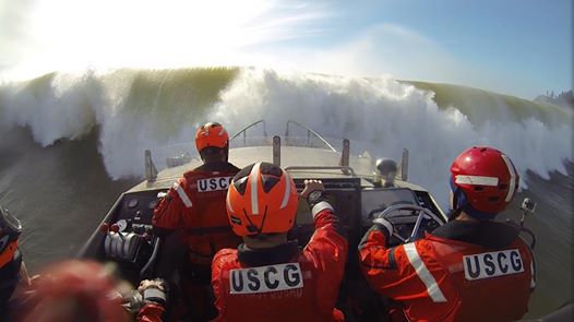 Coast Guard boar Bering into a wave.